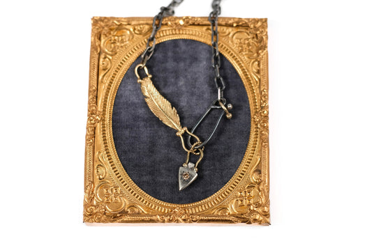 Gold feather charm holder